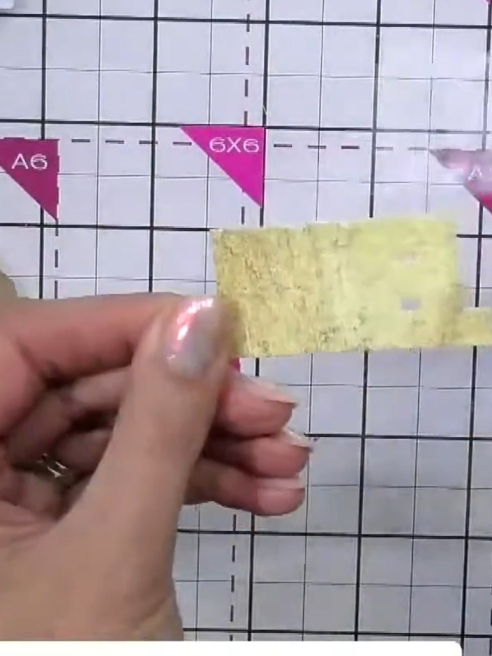 Step 7: Apply a darker ink colour such as brown or black around the edges of the bauble pieces and the tassel area to 