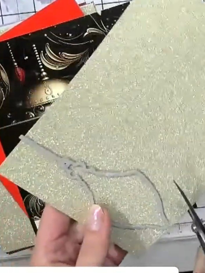 Step 2: Die-cut the bauble shape from gold sparkle paper. This will form the front of your layered bauble decoration.