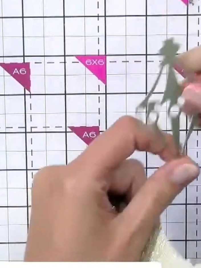 Step 6: Attach the tassel element to the top of the bauble. Position it centrally and secure in place.
