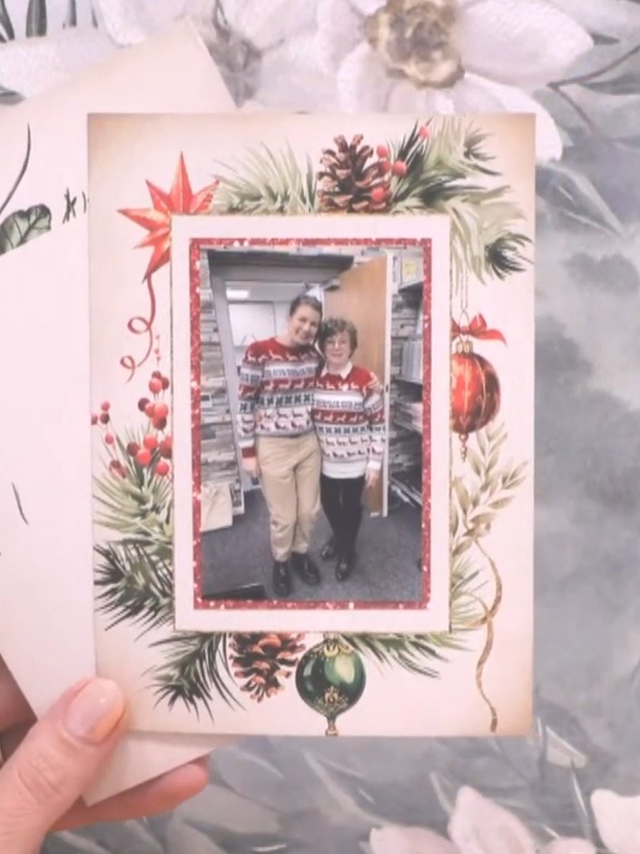 Step 3: Adhere a decorative panel with festive foliage and pinecone design to your scrapbook page. Mount your chosen p