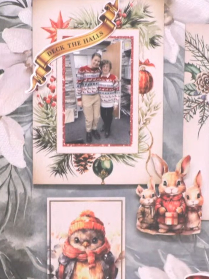 Step 7: Adhere all the decorative elements to your scrapbook page using foam pads to create dimension. Position the 'D