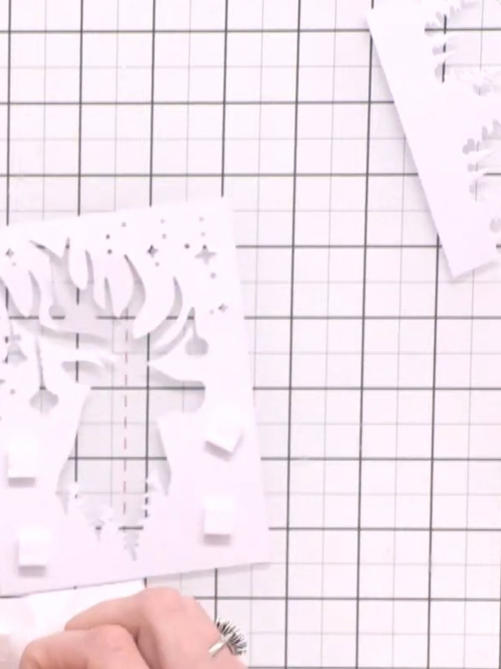 Step 6: Add foam pads in random places on the back of your die-cut tree silhouette panel to create dimension.