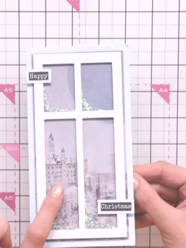 Step 2: Die-cut the window design from white card stock to create your frosted window pane effect. The die creates a f