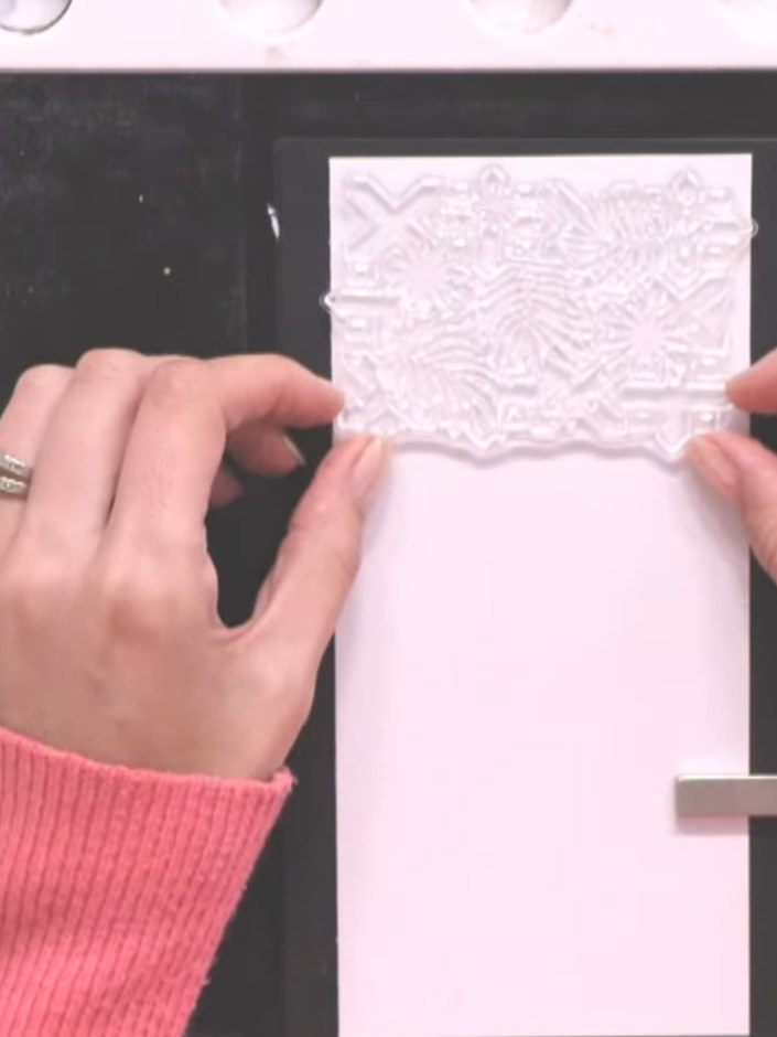 Step 1: Use an antistatic bag to remove any static from your white card panel before stamping.