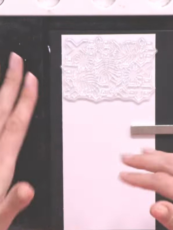 Step 4: Stamp the same abstract tile design at the bottom of the white card panel using the Midnight hybrid ink, spaci