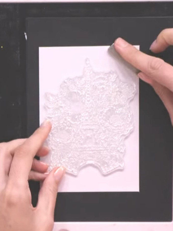 Step 3: Stamp the design a second time onto white cardstock using the no-line ink pad to create a lighter, more subtle