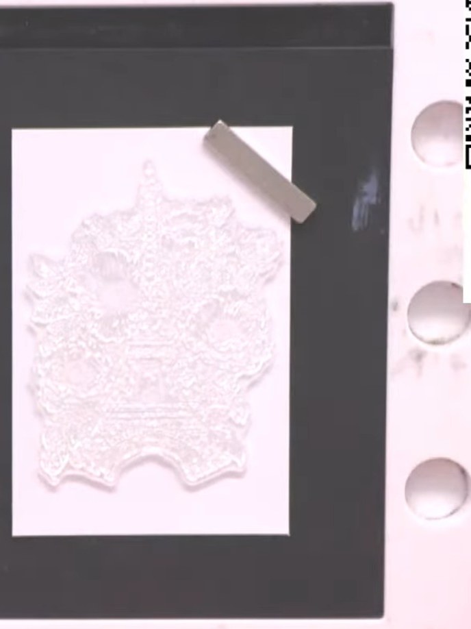 Step 4: Squeeze watercolour ink from the pad onto a ceramic mat. Spray the ink with water to create a puddle for paint