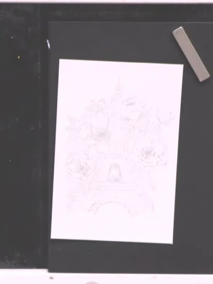 Step 6: Allow the watercolour to blend and disperse into the no-line outline as it dries. The design will gradually be