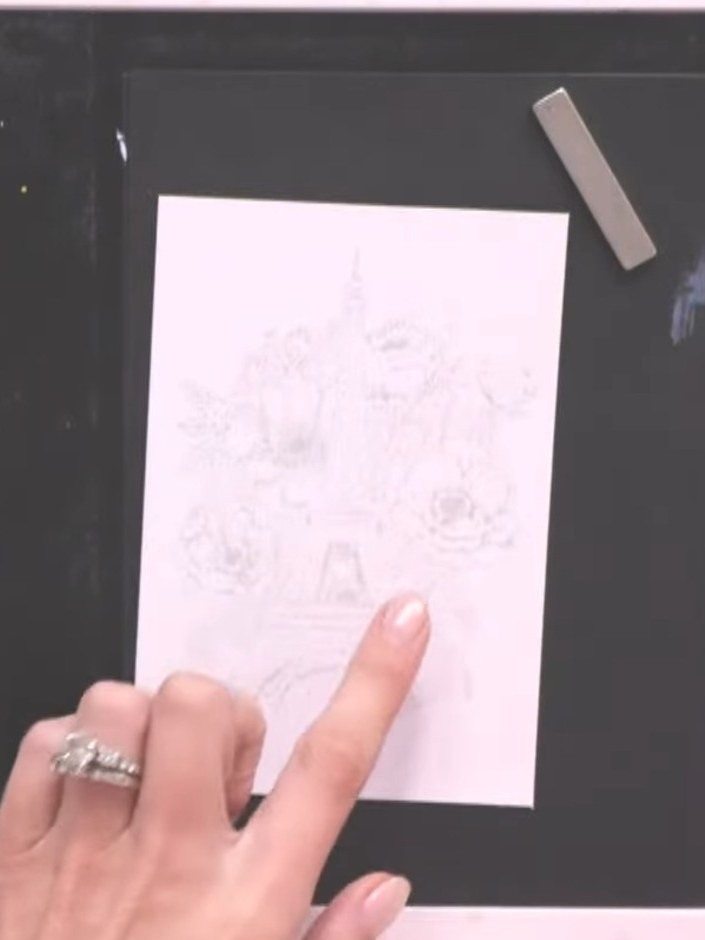 Step 7: Paint additional petals with the watercolour ink pad, allowing the pink colours to blend naturally on the card