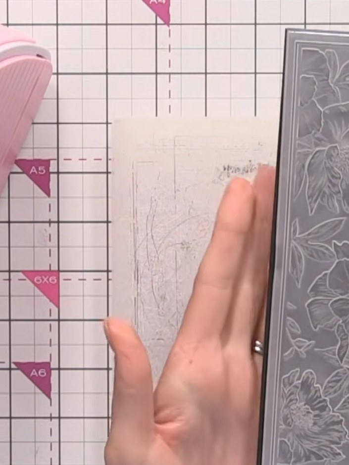 Step 1: Cut your black cardstock to the appropriate size to fit your slimline embossing folder.
