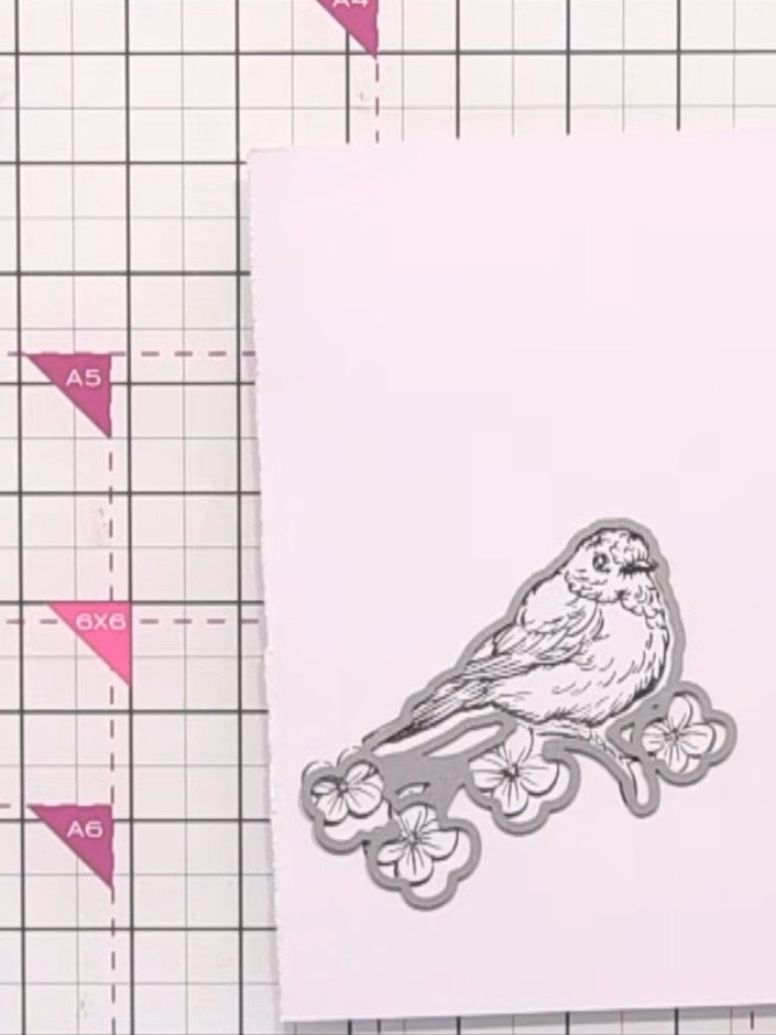 Step 5: Colour the flowers on the bird stamp using coordinating dyes if desired. Apply the dye carefully to the small 
