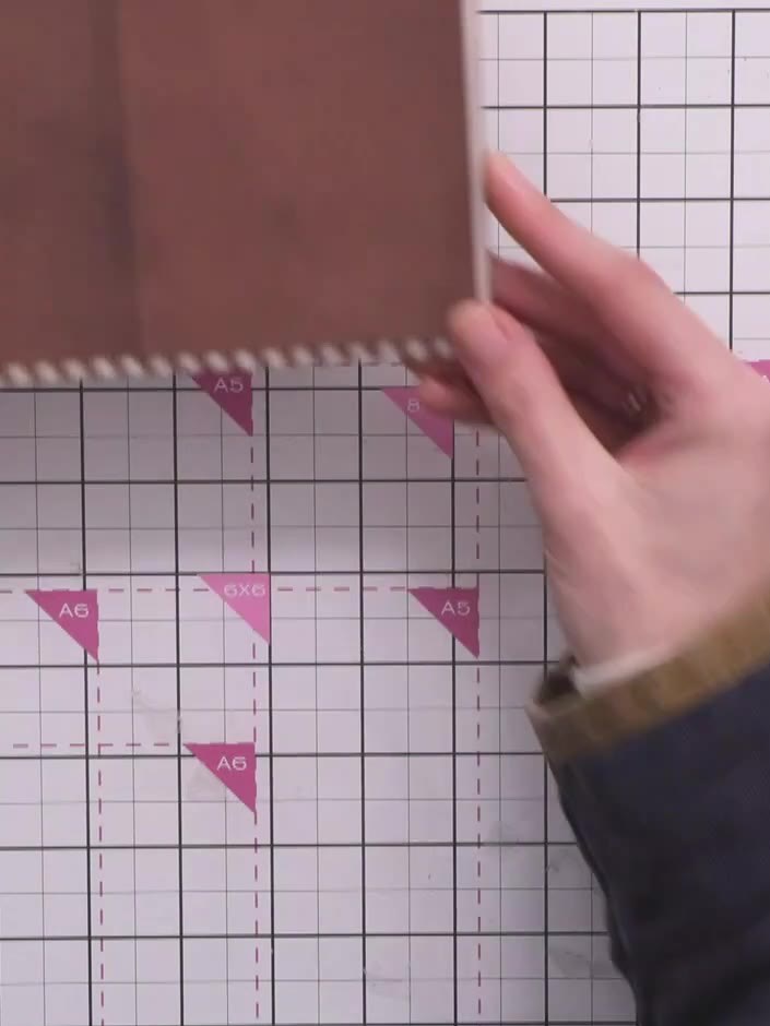 Step 9: Cut strips of card stock and score them at regular intervals to create hinges. The measurements should be base