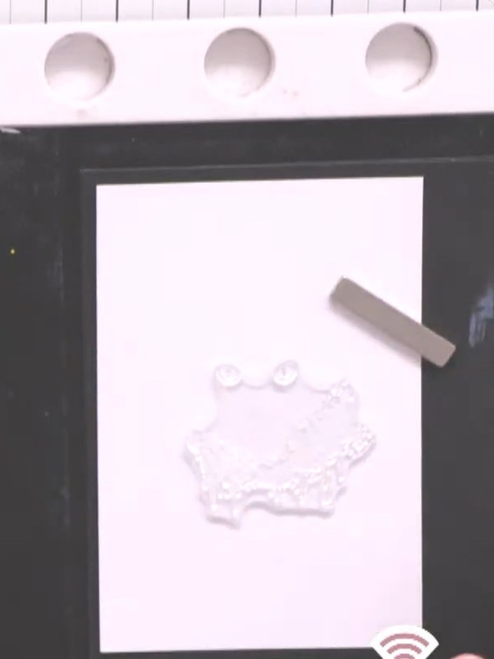 Step 2: Ink up just the eyes portion of the cat stamp with yellow ink, carefully applying the ink only to the coloured
