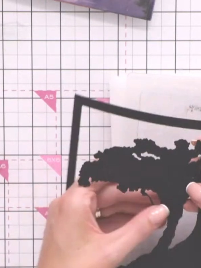 Step 2: Carefully pop out all the tree pieces from the black die-cut frame, ensuring the outer frame border remains in