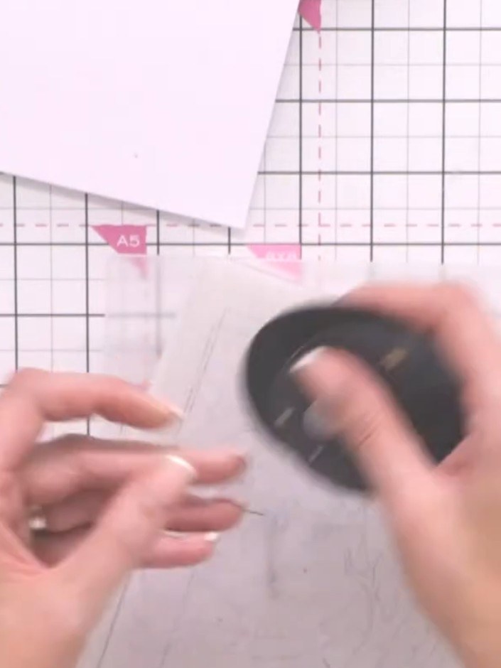 Step 5: Cut cloud shapes from white or light-coloured paper. You can either fussy-cut them by hand or use a die-cuttin