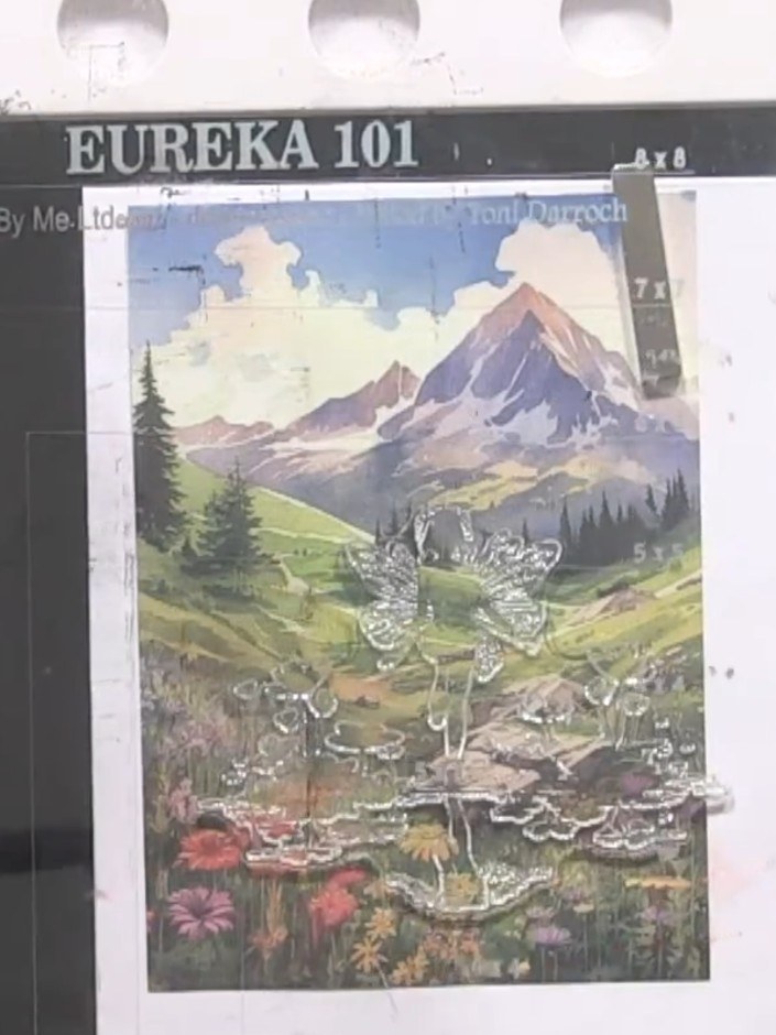 Step 3: Stamp the fairy silhouette in black ink onto the lower portion of your mountain landscape card, positioning it
