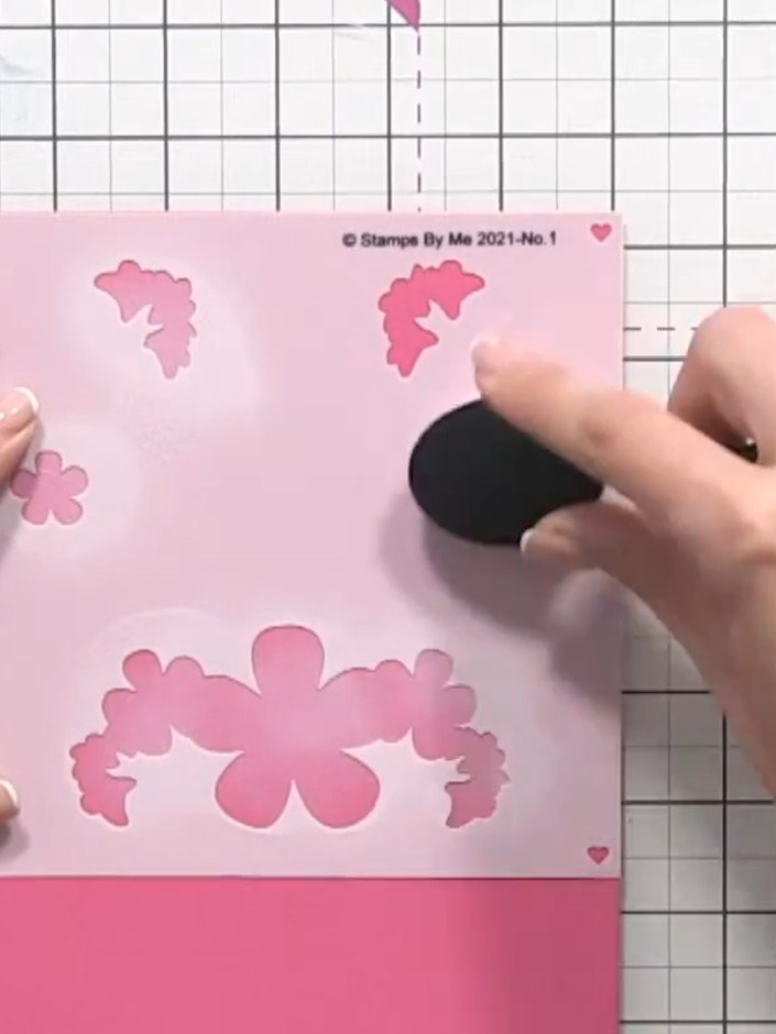 Step 4: Position the second stencil (number two) on your card, aligning it with the edge. Apply white ink through the 