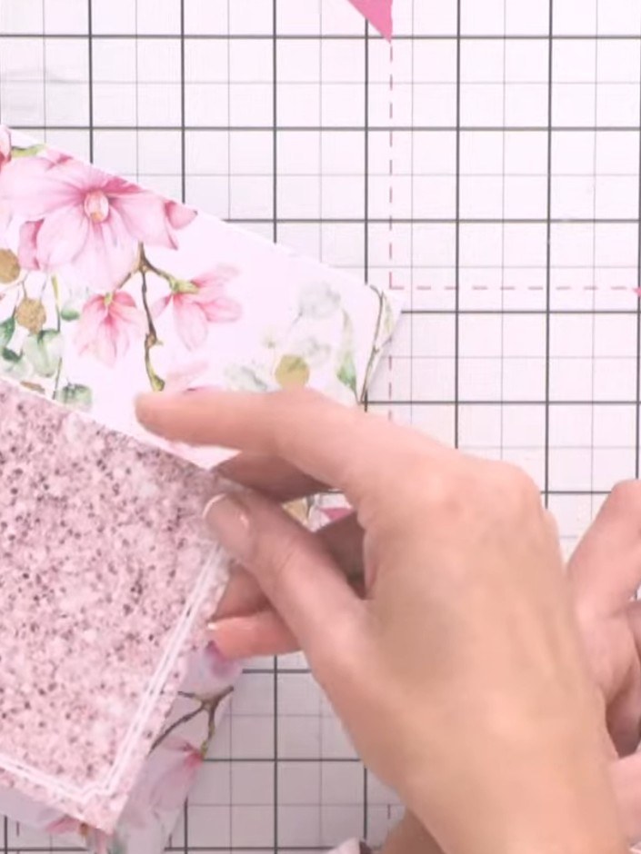 Step 3: Adhere the floral topper to the front of the card blank using foam pads for dimension.