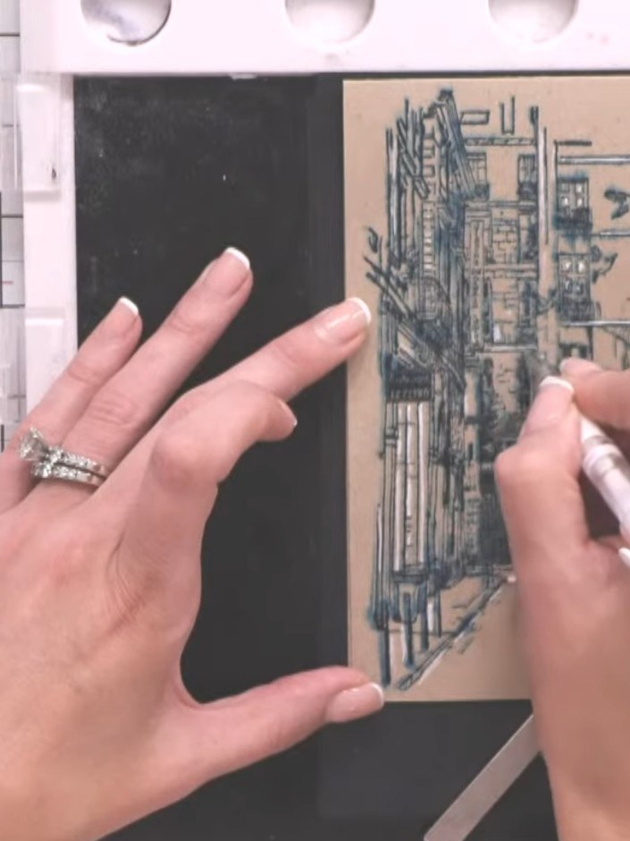 Step 8: Using a white gel pen or paint pen, add highlights to small windows and architectural details you wish to emph