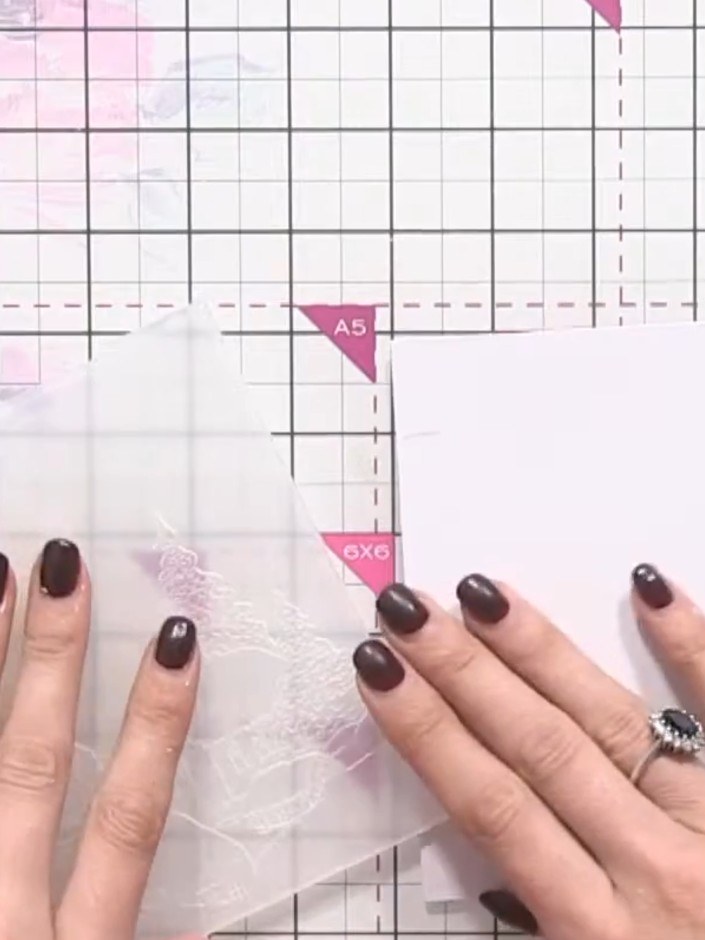 Step 5: Remove the embossed card from the folder and set it aside to allow the embossing to dry completely.