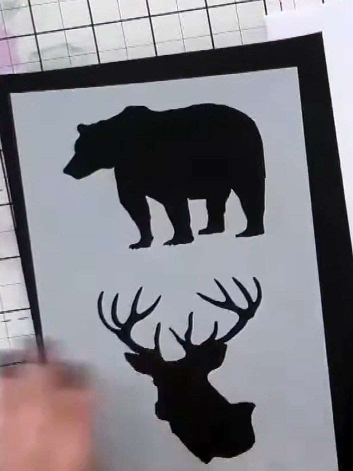 Step 1: Select a piece of grey card stock from the Woodland Wildlife bumper paper pack as your base. Place it on your 
