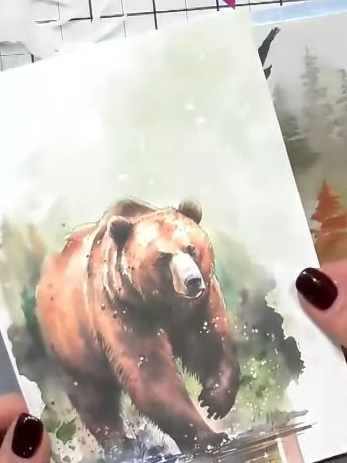 Step 5: Use a stencil to add atmospheric effects around your stamped animal. Position the stencil over the image and a