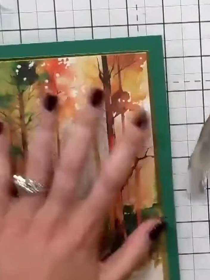 Step 2: Cut or fussy-cut an animal design, such as an owl, from the Woodland Wildlife paper pack using scissors.