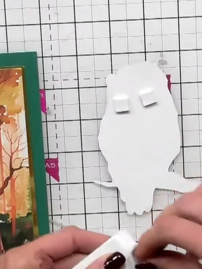 Step 3: Apply glue to the back of your cut-out animal shape and adhere it onto a piece of white mirror board or contra