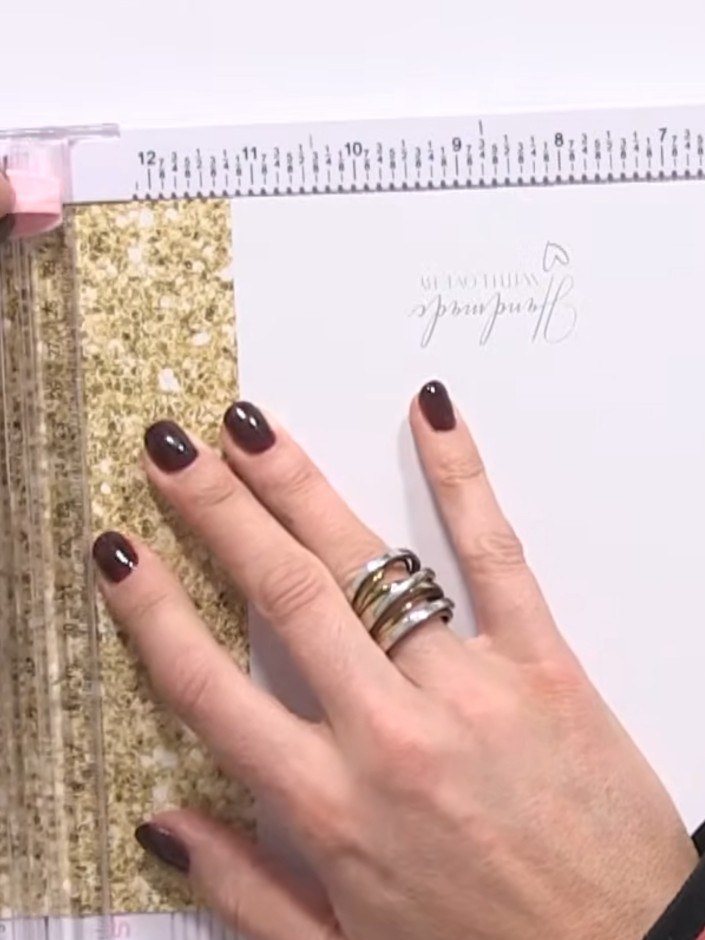 Step 5: Position alternating panels down the centre of your card base. Place them side by side to create a balanced, p
