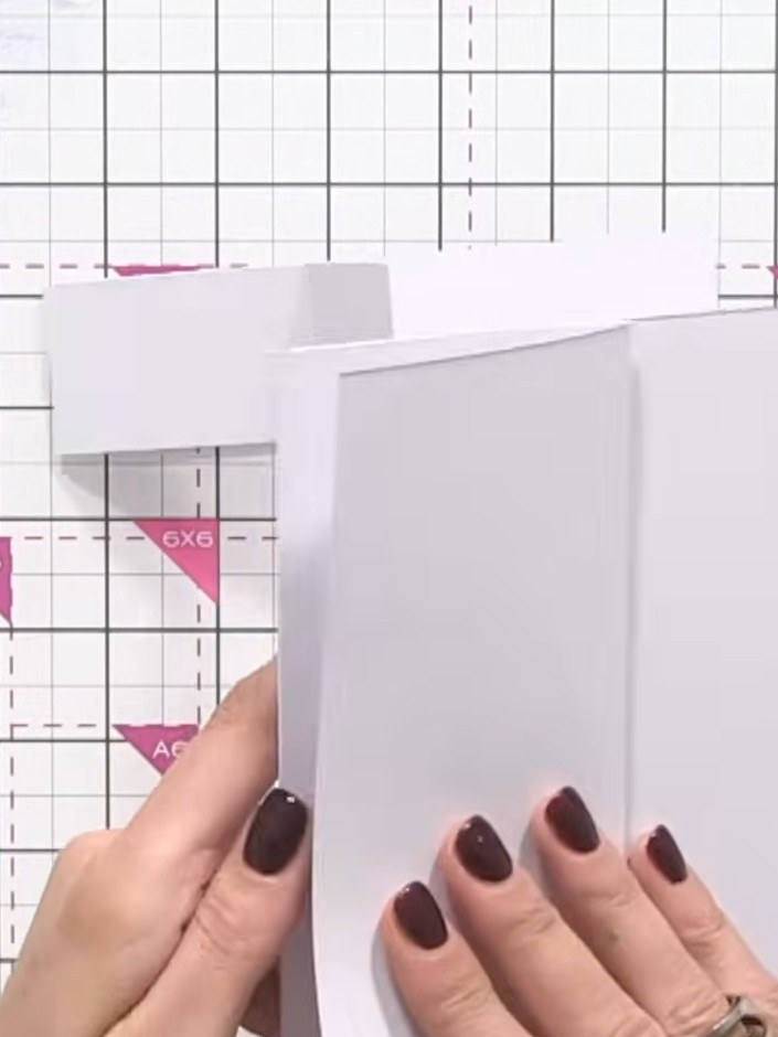 Step 4: Trim approximately 1 to 1.5 inches from the bottom of the white card base to create the offset piece for the z