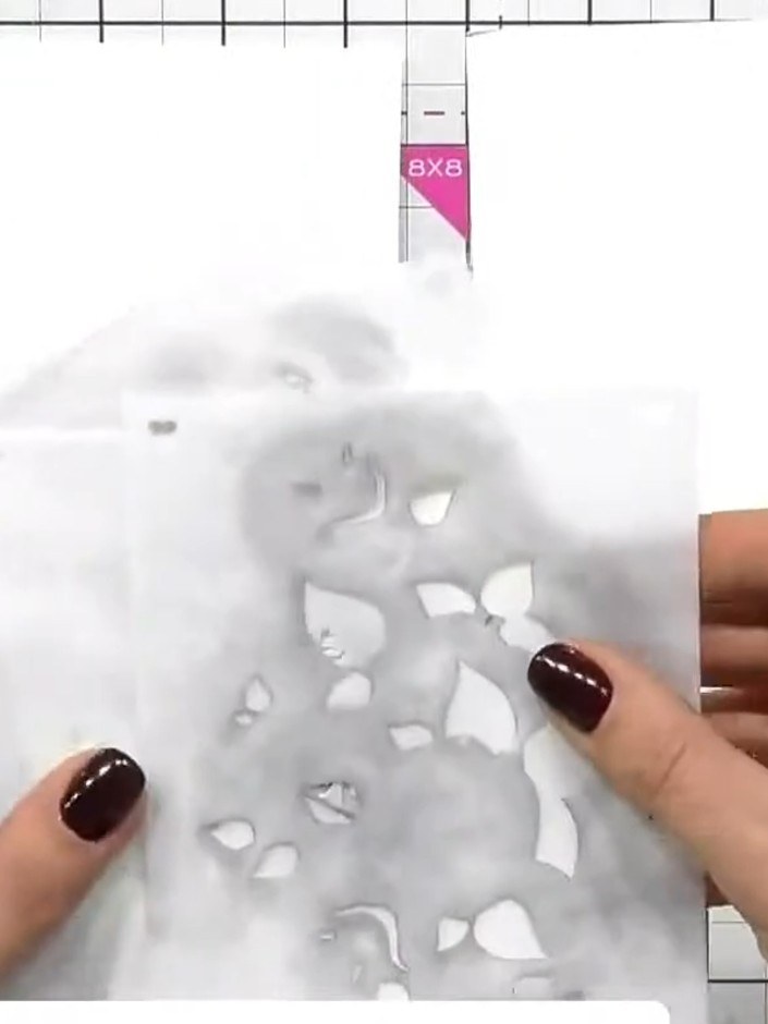 Step 2: Place stencil number one on your white card stock, aligning it as desired. Apply ink through the stencil using