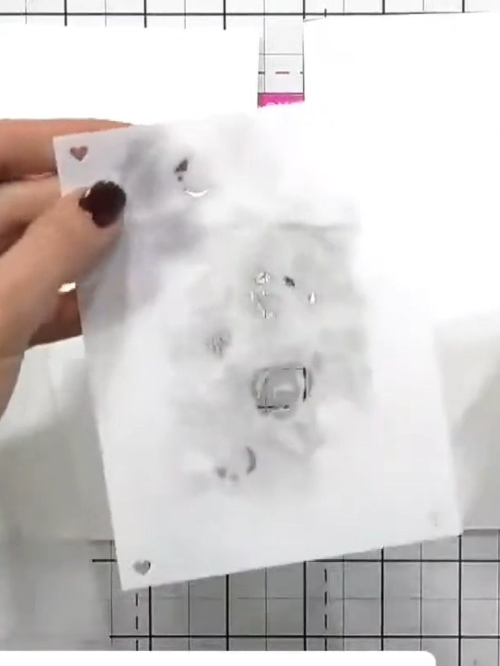 Step 3: Use a heat tool to dry the first inked layer completely. Once dry, lightly moisten the inked area with water u