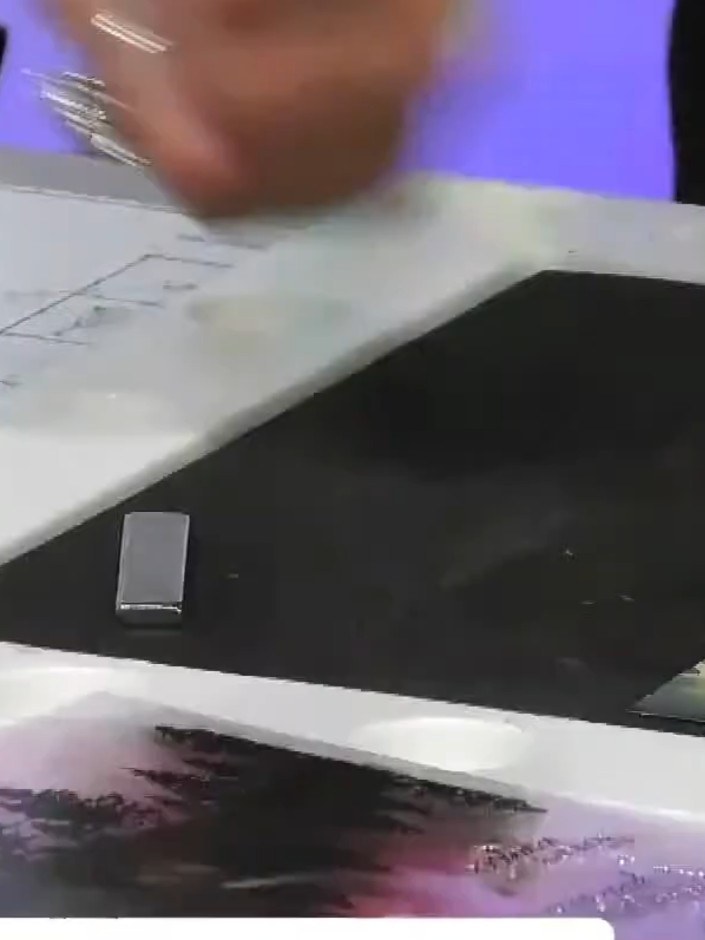 Step 2: Ink your reflection tree stamp fully with black ink and stamp it onto the first panel, positioning the reflect
