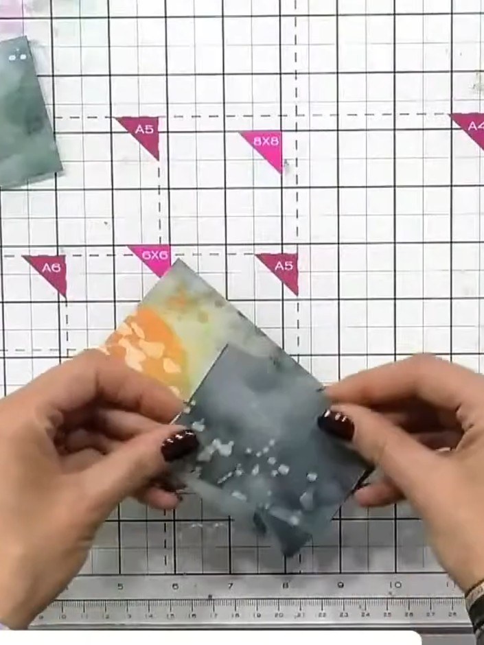 Step 3: Apply ink only to the top portion of the tree stamp. Stamp this onto the bottom section of the same panel to c