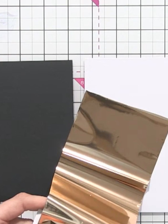 Step 2: Cut two pieces of rose gold foil from the sheet to the length of your black card blank using sharp scissors.