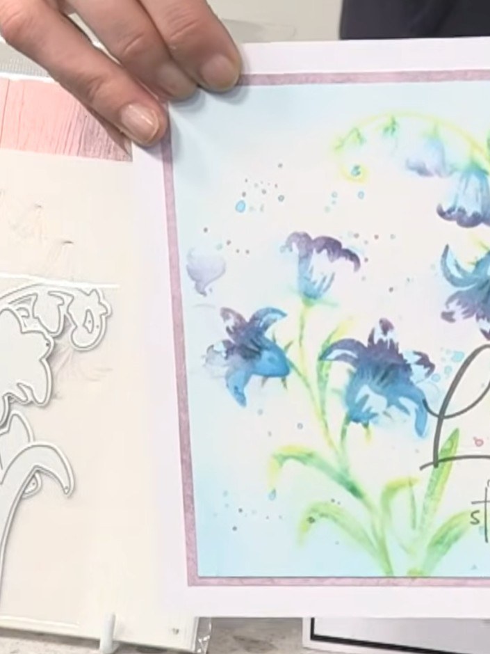 Step 5: Spray the card lightly with water to blend the dyes and create a watercoloured effect. The water will soften t