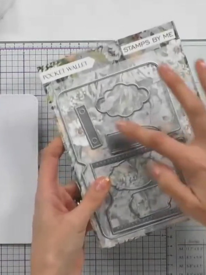 Step 1: Cut two pieces using the shaped wallet die to create your card base and backing layer. Position the die on whi