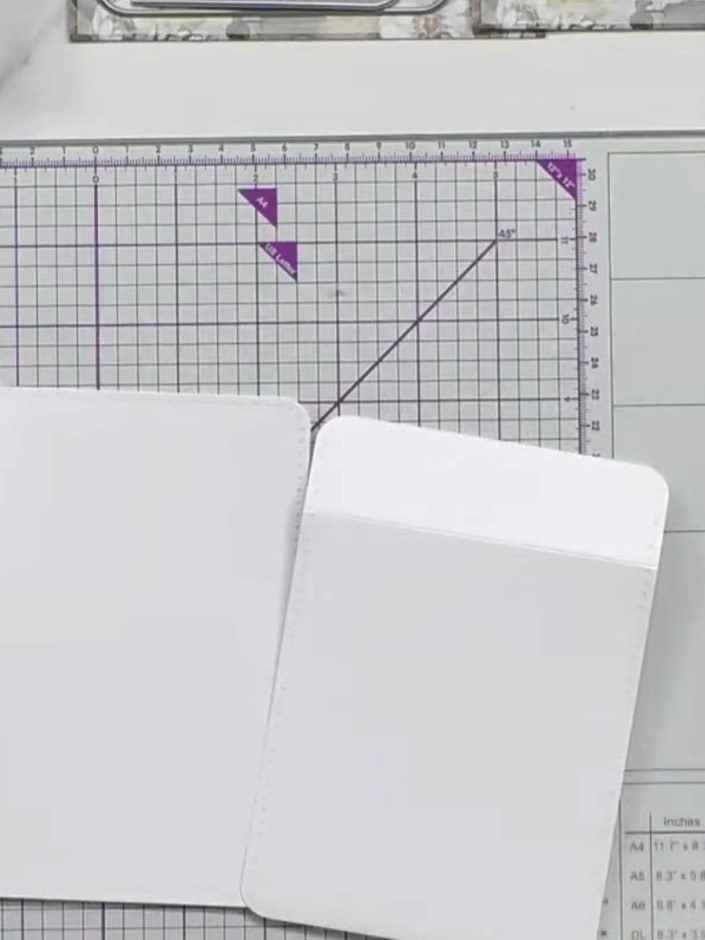 Step 2: Score a line across the back piece of white card to create a fold for dimension.