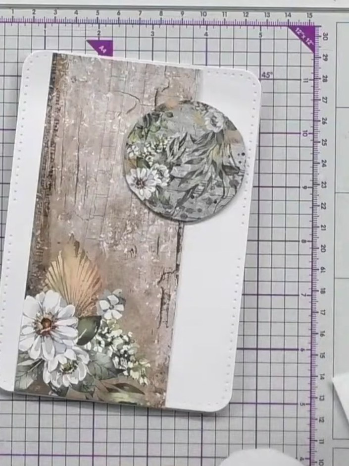 Step 4: Stamp a 'Happy Birthday' sentiment onto a second circular element. Position this stamped circle on the card al