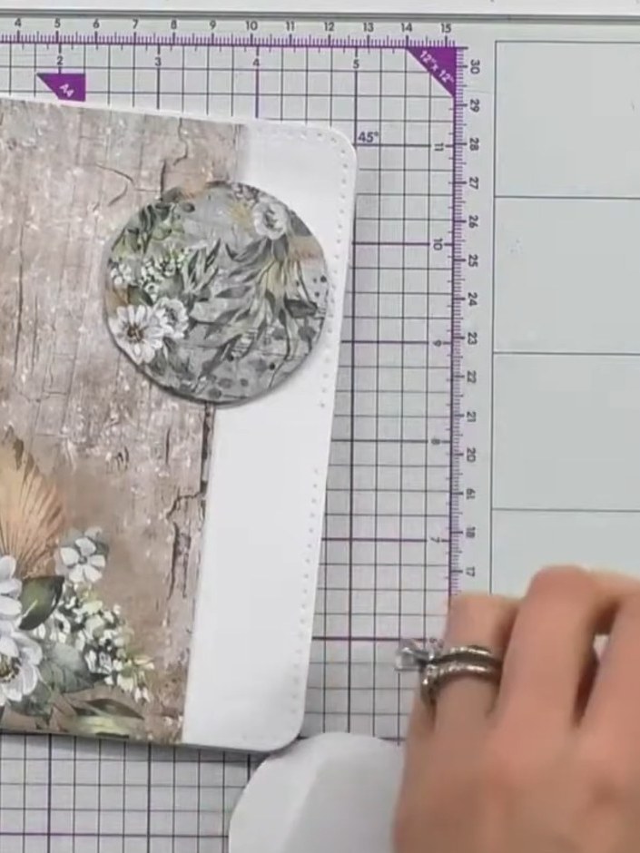 Step 6: Layer the second decorative circle on top of the first circle using foam pads or adhesive, creating multiple l