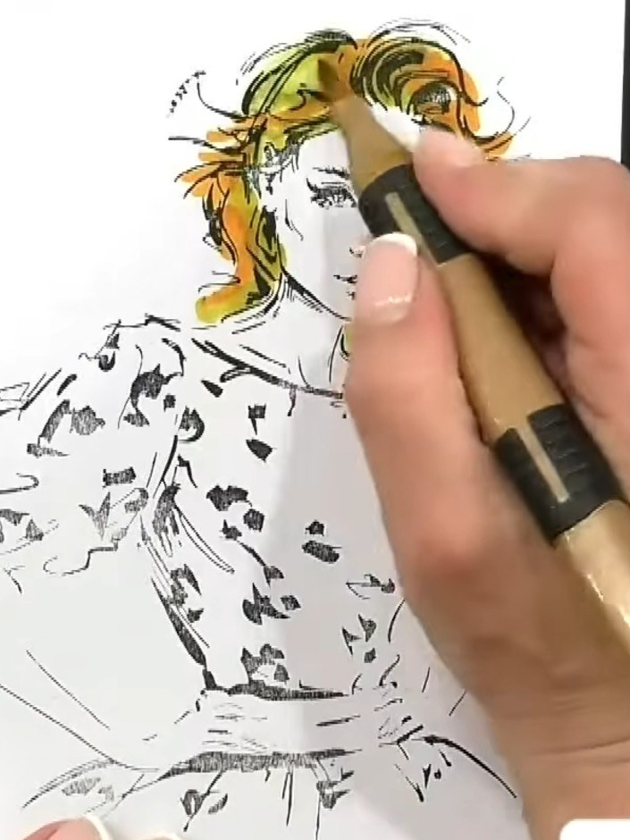 Step 4: Blend in a mid-tone yellow or orange marker throughout the hair, building up the colour gradually. Work the co