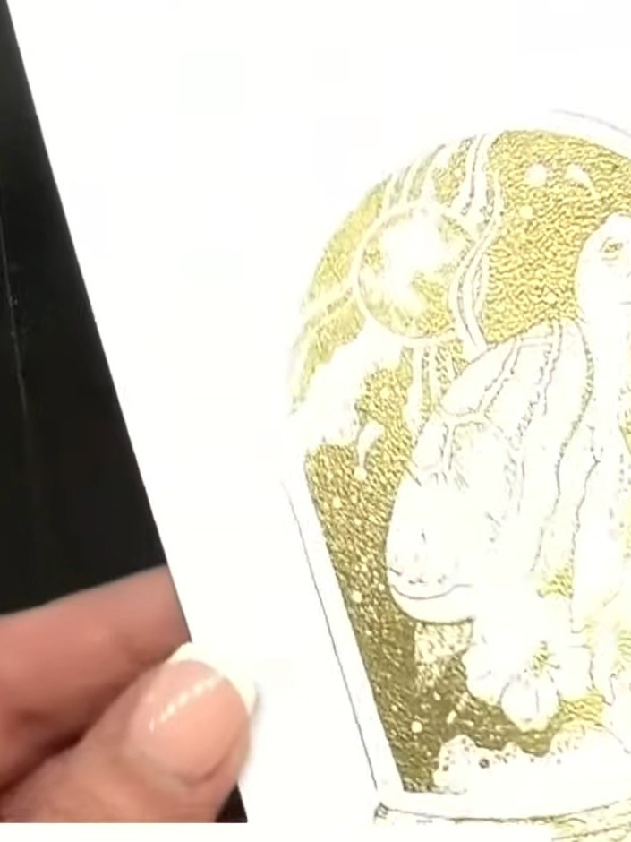 Step 8: Colour the embossed image with alcohol markers or watercolours, working carefully within the embossed lines to