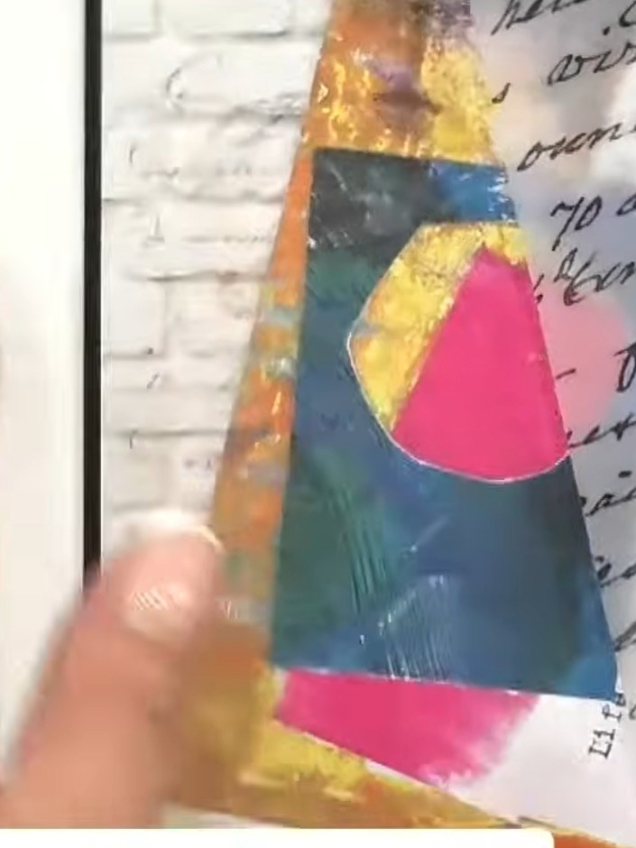 Step 9: Add additional decorative paper layers in complementary colours. Smoosh them onto the background using ink to 