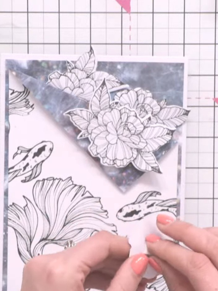 Step 8: Apply foam pads to the back of the trimmed floral elements. Position the flowers with dimension inside the poc