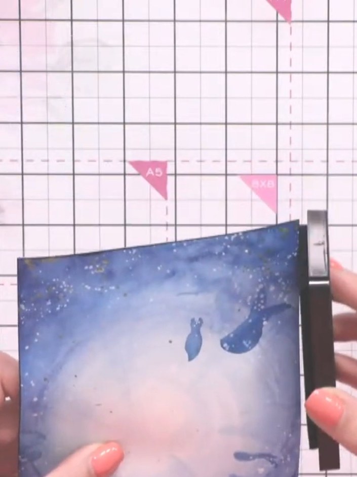 Step 11: Edge the entire card with black ink pad using a blending tool to frame and finish the design.