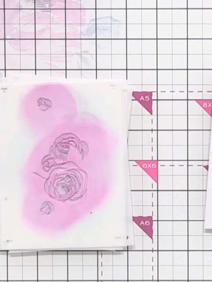 Step 1: Gather your numbered layering stencils (1-4), a spray bottle filled with water, an ink pad, and a brush. Posit