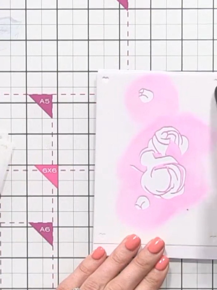 Step 2: Place stencil number one on your card stock, lining it up at the top. Use the heart registration marks on the 
