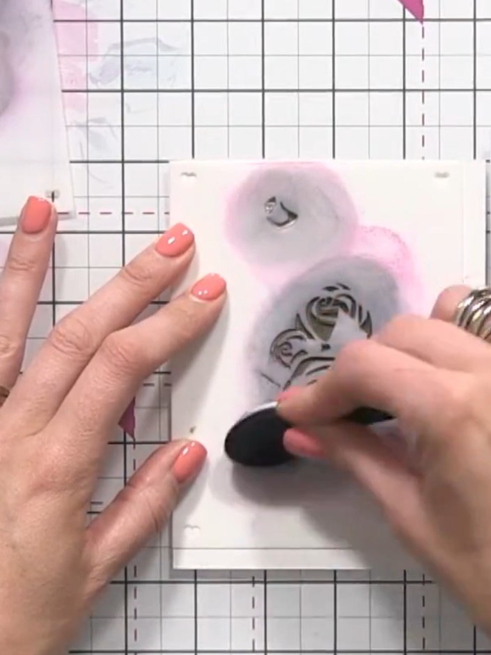 Step 6: Position stencil number two over your first layer. Press your ink pad firmly onto the stencil to create a seco