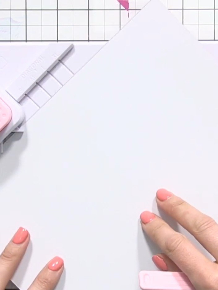Step 2: Place your card stock into the envelope maker tool, aligning it at the 4 inch score line marking on the white 