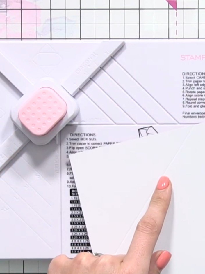 Step 4: Punch along the scored line using the punch feature on the Box and Envelope Maker tool. Position the tool over